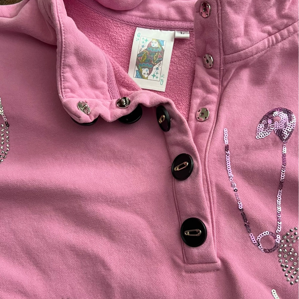 Pink Queen of Sparkles pullover - safety pins
